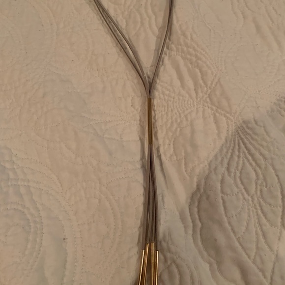 Jewelry - Grey and gold leather tassel necklace